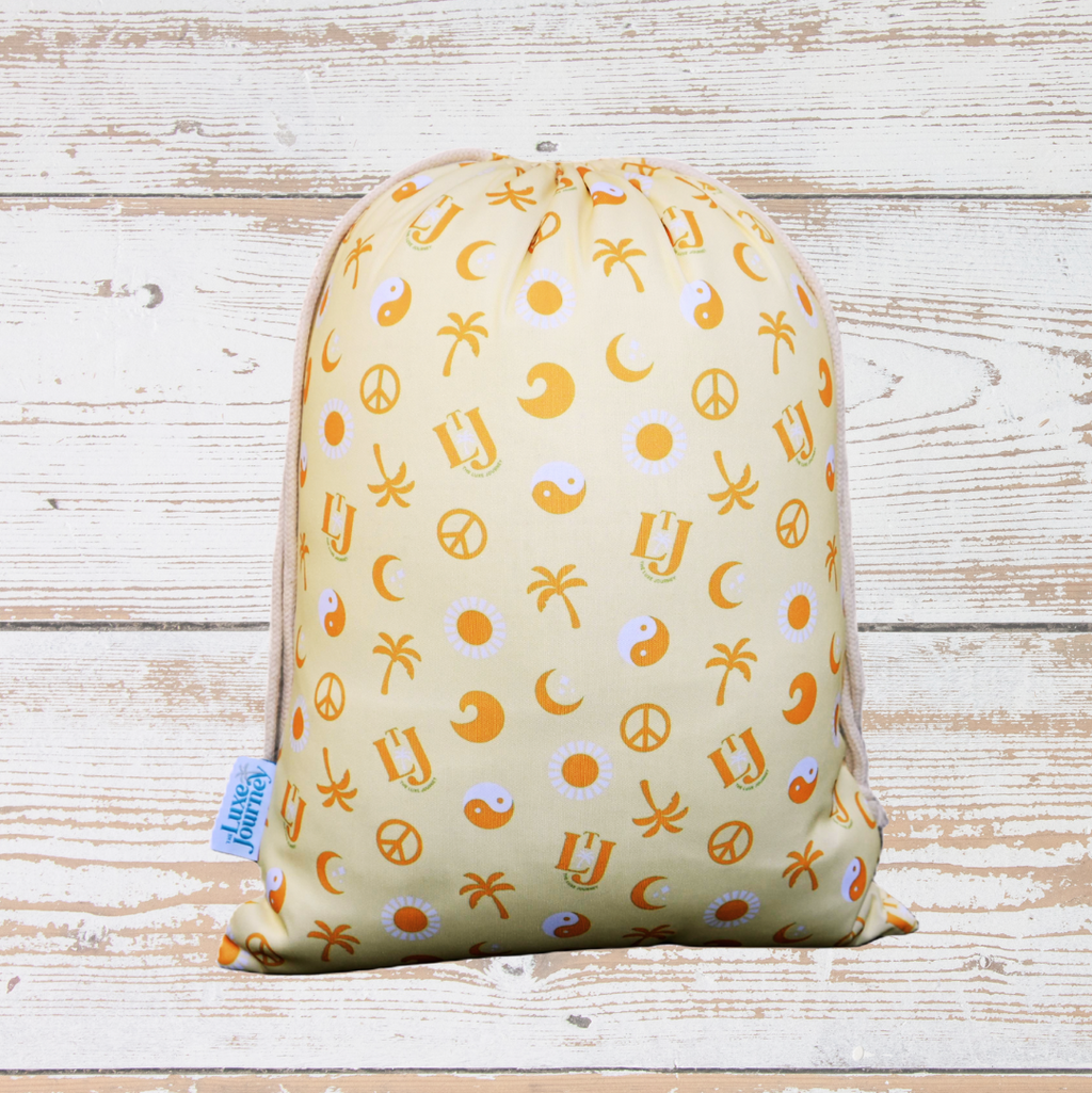 The Drawstring wet bag in the colour yellow
